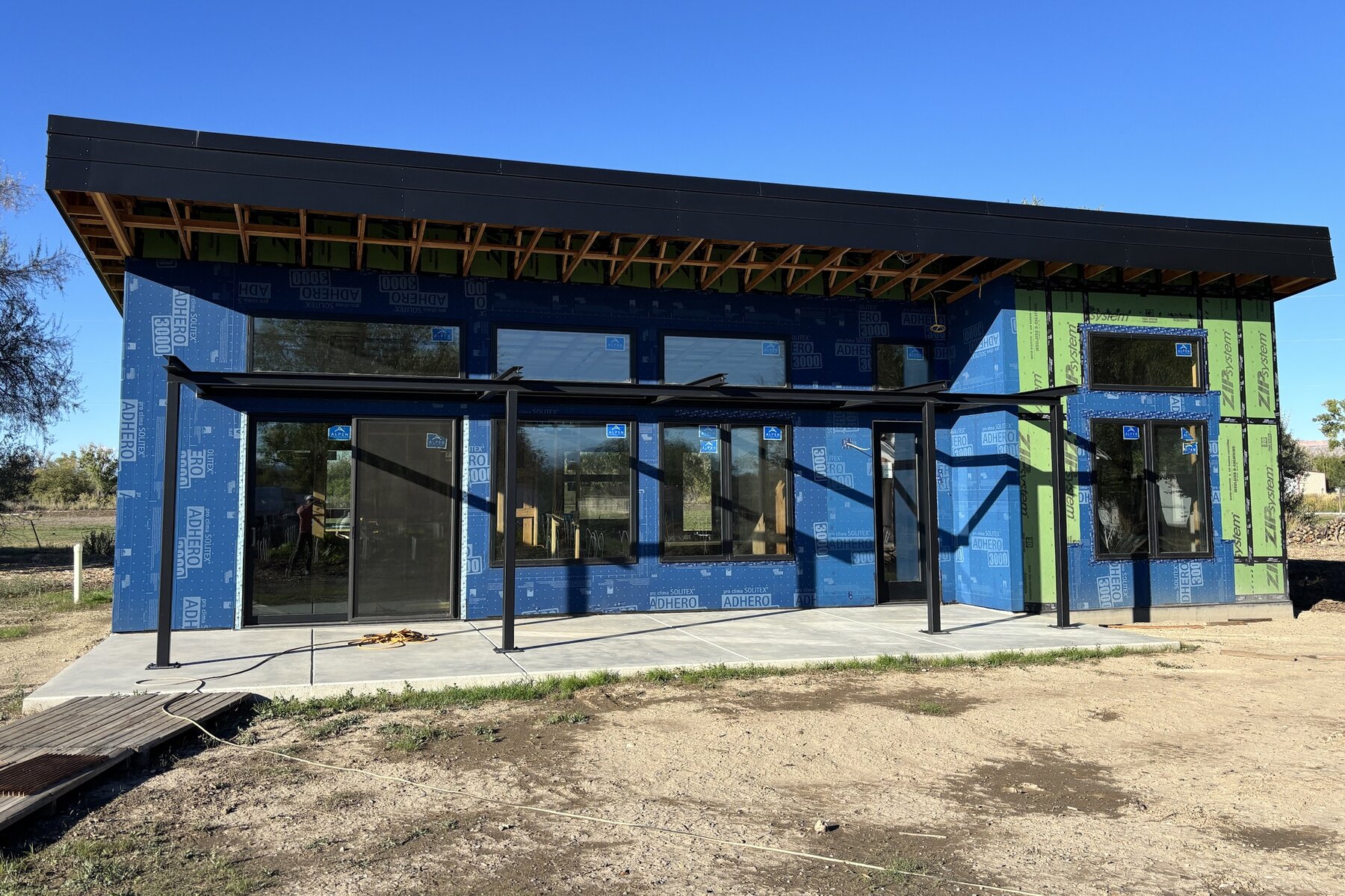 Main house, south side with the steel pergola